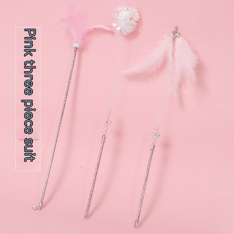 Cat Wand Toy Set Feather Bell in pink three-piece set on a light background.