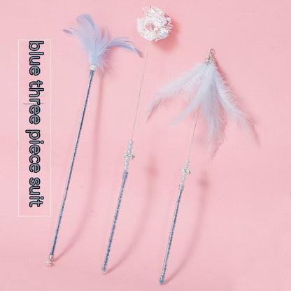 Cat Wand Toy Set Feather Bell in pink three-piece set on a light background.